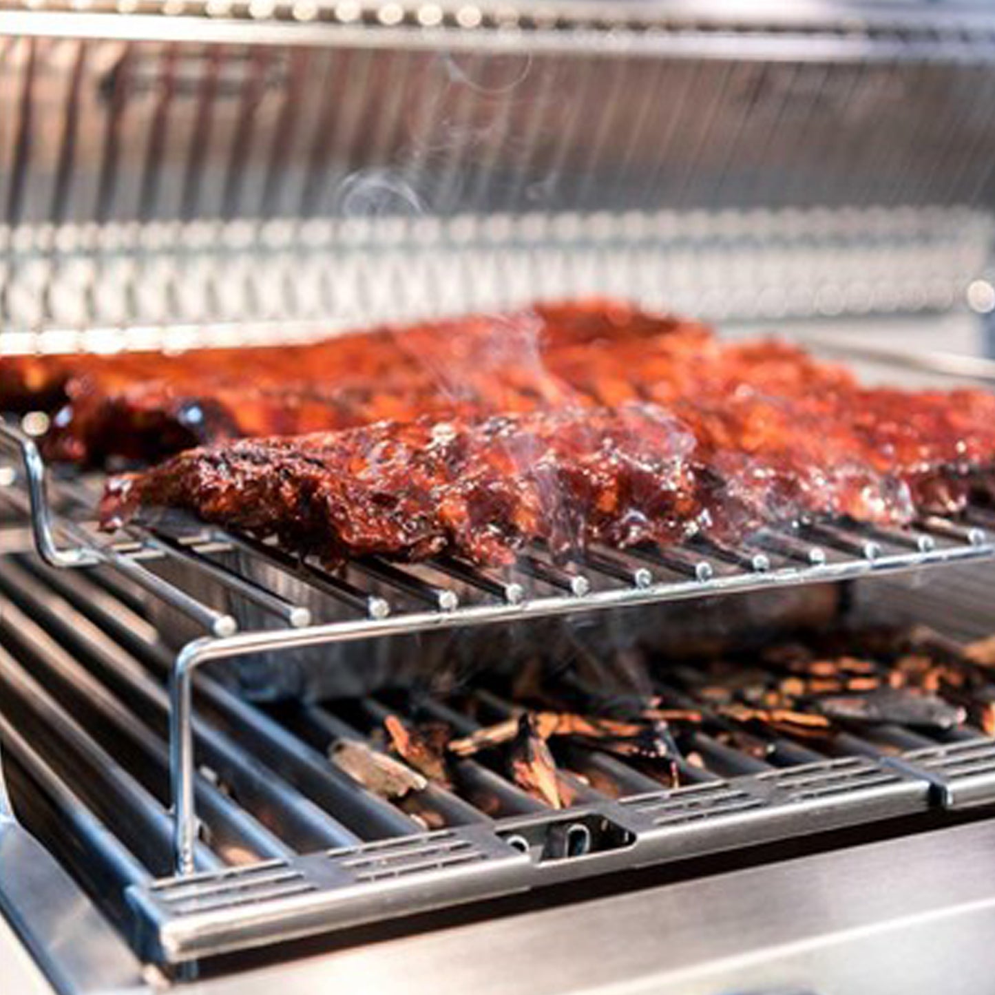 Grille de rôtissage XL — surface élargie pour grosses pièces sur BBQ Saber Deluxe